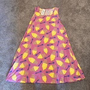 NWT Dole whip swing dress. Medium, runs large. Disney dress with pockets